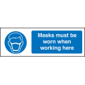 Masks must be worn when working here sign