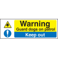 Warning guard dogs on patrol keep out sign