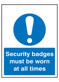 Security badges must be worn all times sign